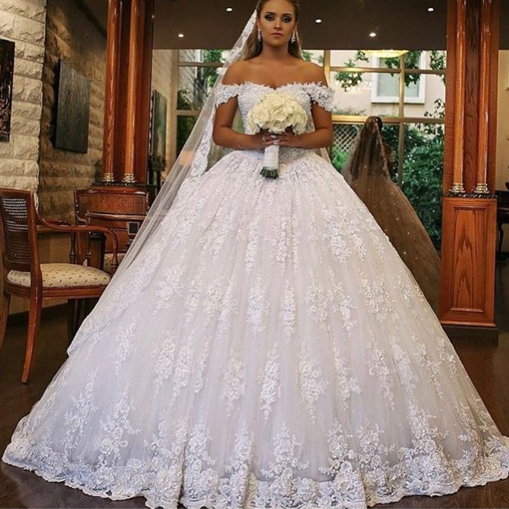 
                      
                        Luxury Long Off-the-Shoulder Ball Gown Wedding Dress with Lace and Train
                      
                    