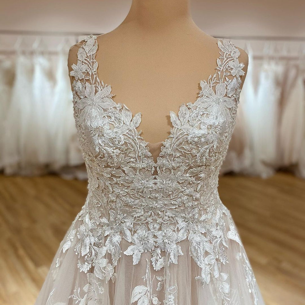 
                      
                        Elegant Deep V-Neck A-Line Spaghetti Strap Wedding Dress with Ruffles and Tulle Lace Appliques
                      
                    