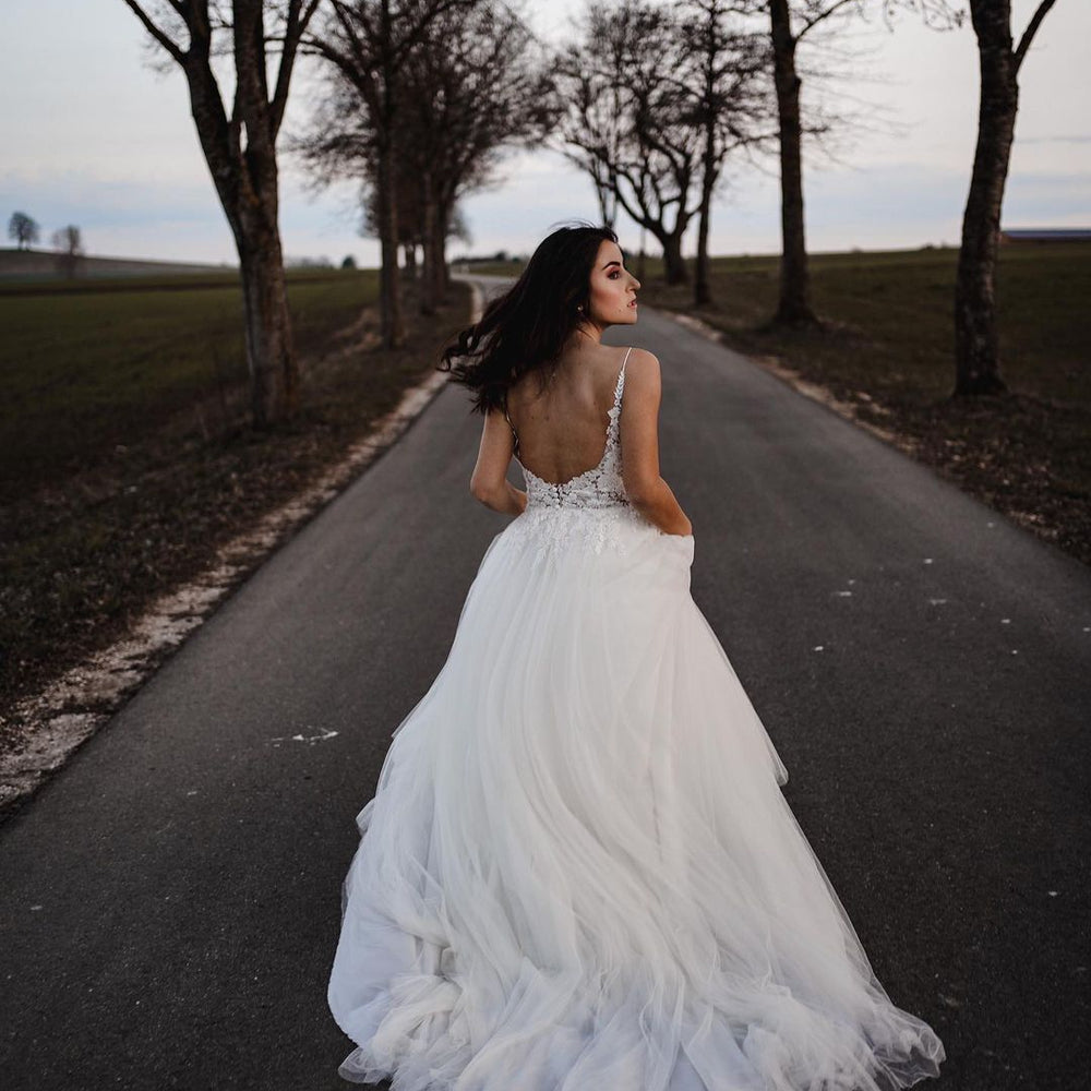 
                      
                        Simple Long A-Line V-Neck Tulle Wedding Dress with Appliques
                      
                    