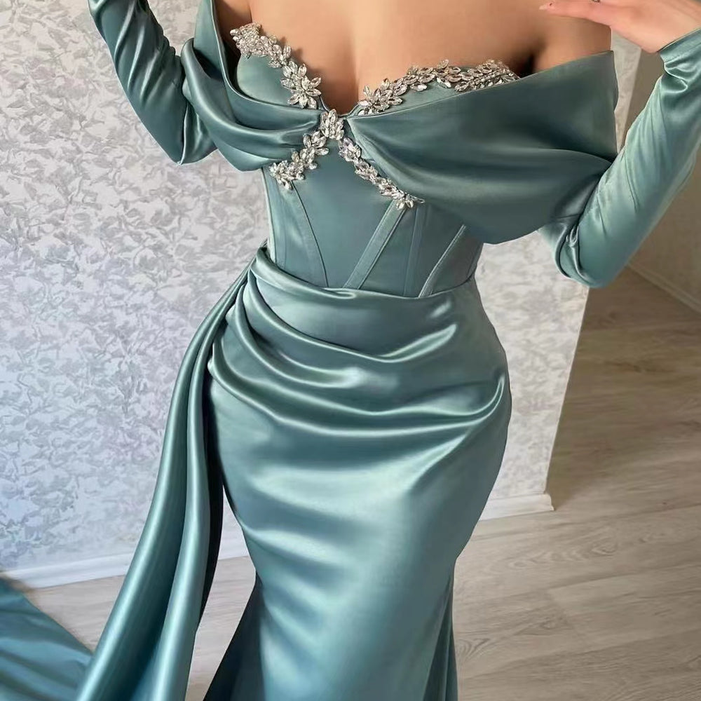 
                      
                        Elegant Sweetheart Long Sleeve Mermaid Prom Dress with Rhinestone Ruffles
                      
                    