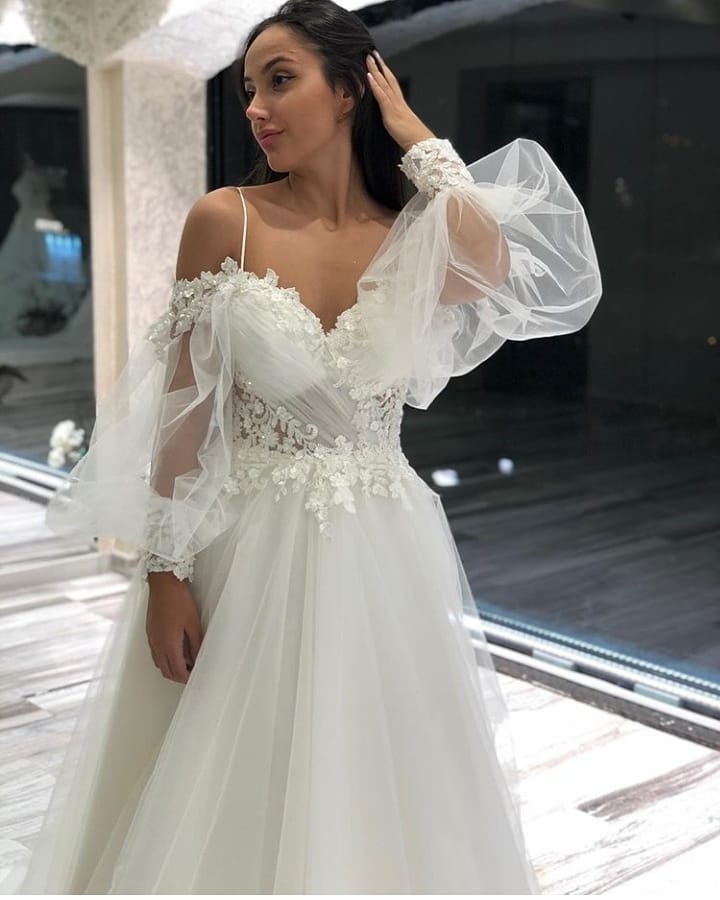 
                      
                        A-Line Off-the-Shoulder Long Sleeve Spaghetti Strap Wedding Dress with Lace Appliques and Tulle
                      
                    