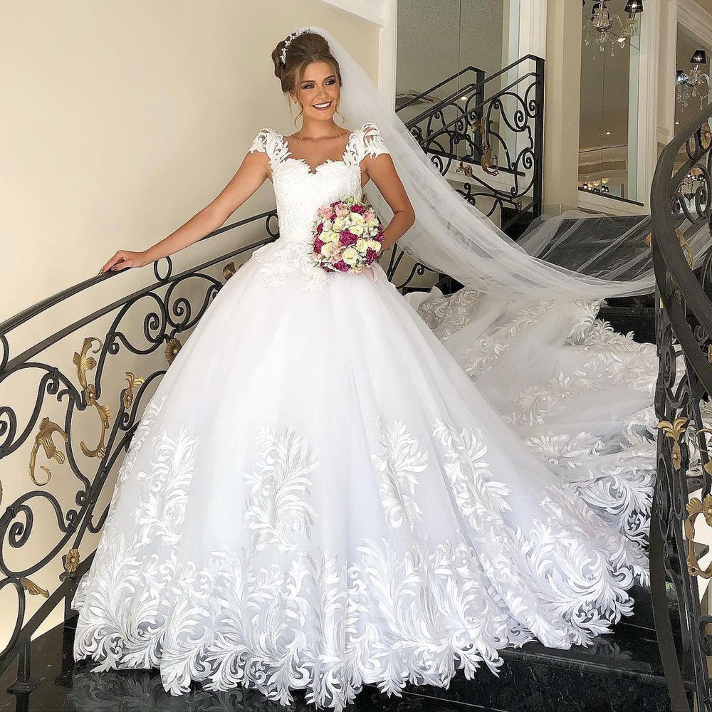 
                      
                        Elegant Long Cap Sleeve Princess Wedding Dress with Tulle Lace
                      
                    