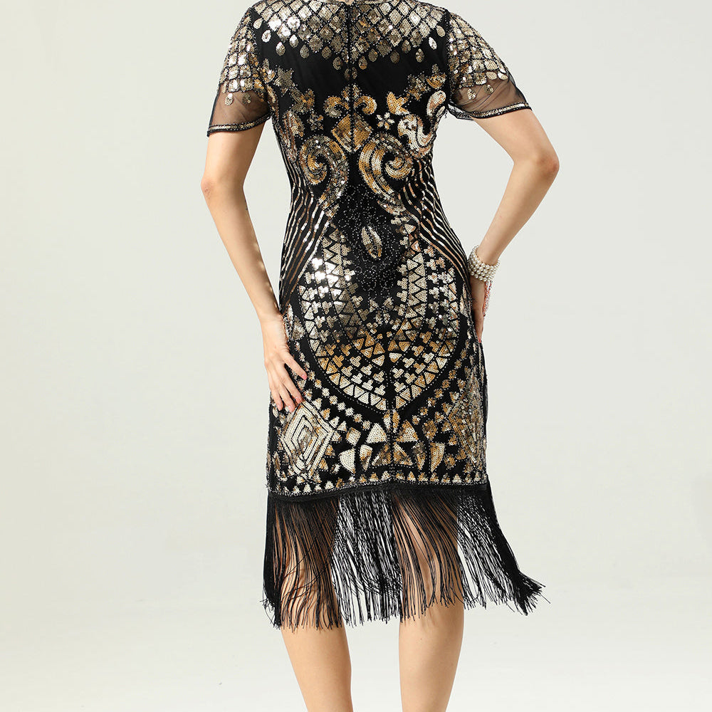 
                      
                        Black and Gold Sequin Dress with Batwing Sleeves
                      
                    