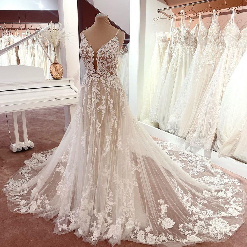 
                      
                        Long A-Line V-Neck Sleeveless Floral Lace Wedding Dress with Tulle and Boho Style
                      
                    