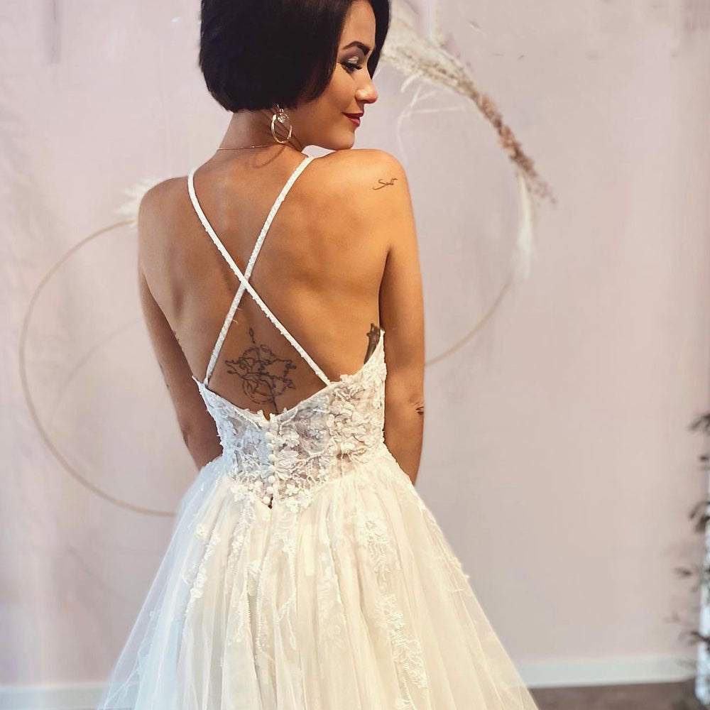 
                      
                        Long A-Line Deep V-Neck Spaghetti Strap Backless Wedding Dress with Lace Tulle
                      
                    