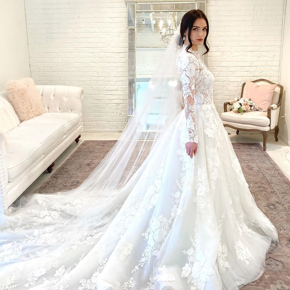 
                      
                        Long A-Line High Neck Open Back Wedding Dress with Lace Sleeves
                      
                    