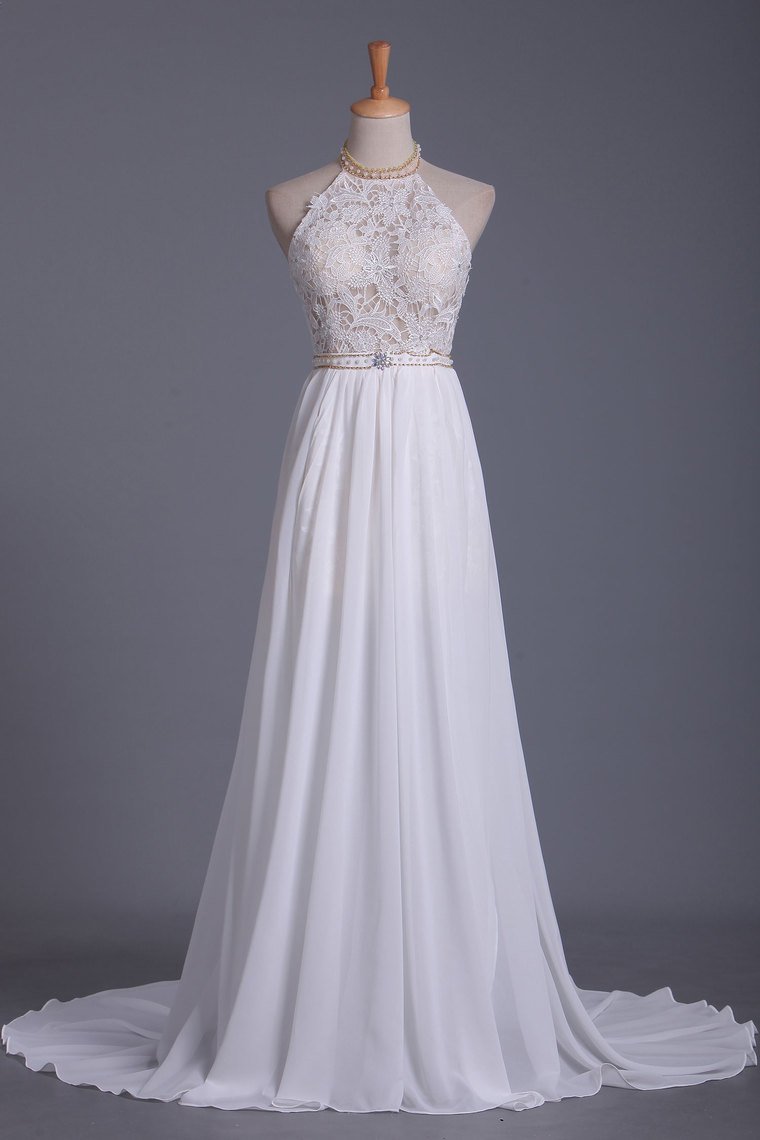 Halter Backless Chiffon A-Line Wedding Dress with Ruffles and Pearl Lace