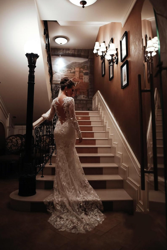 
                      
                        Unique Long Sleeve High Neck Backless Mermaid Wedding Dress with Lace Appliques
                      
                    