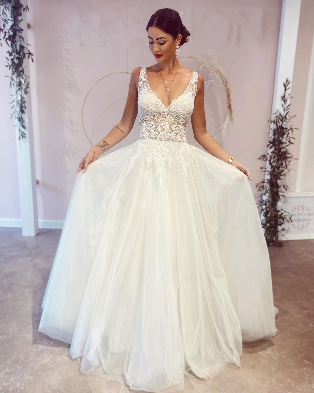 Elegant A-Line Deep V-Neck Backless Wedding Dress with Lace Appliques