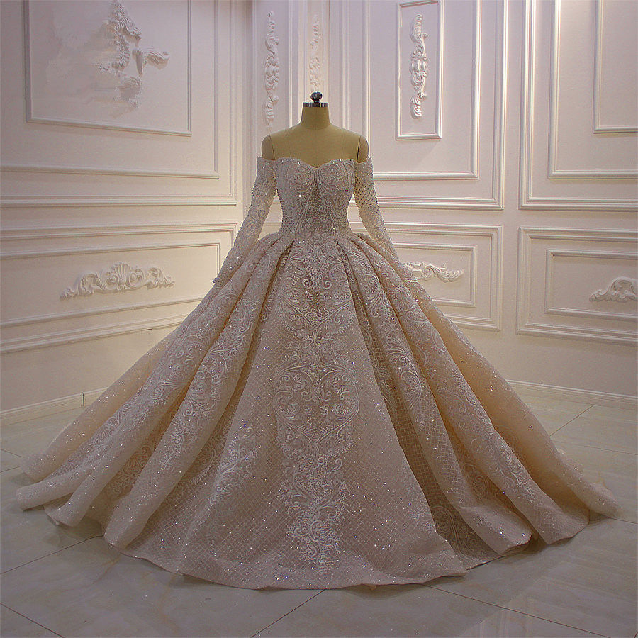 
                      
                        Off-the-Shoulder Long Sleeve Ball Gown Wedding Dress with Lace Appliques
                      
                    