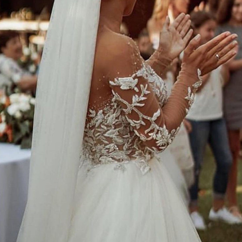 
                      
                        Long Sleeve A-Line Sheer Tulle Wedding Dress with Lace
                      
                    