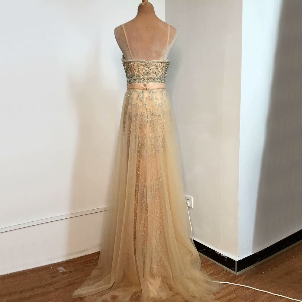 
                      
                        Champagne Sequined Mesh Prom Dress with Sleeveless A-Line Backless Style
                      
                    