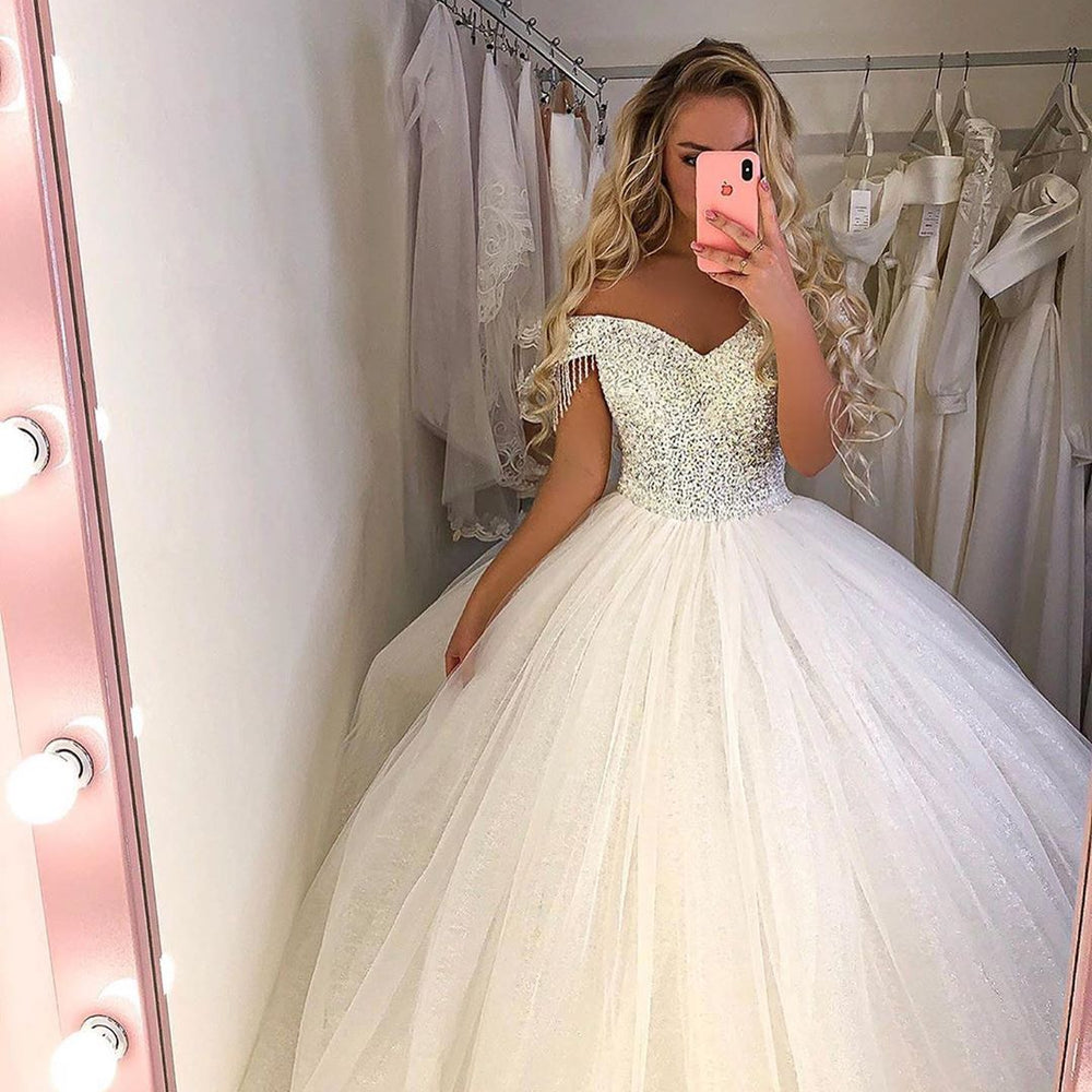 
                      
                        Long Princess Off-the-Shoulder Wedding Dress with Tulle
                      
                    