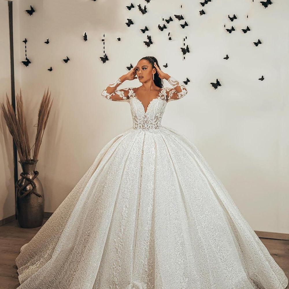 
                      
                        Ball Gown Sweetheart Long Sleeve Wedding Dress with Ruffles, Lace Appliques, and Sequins
                      
                    