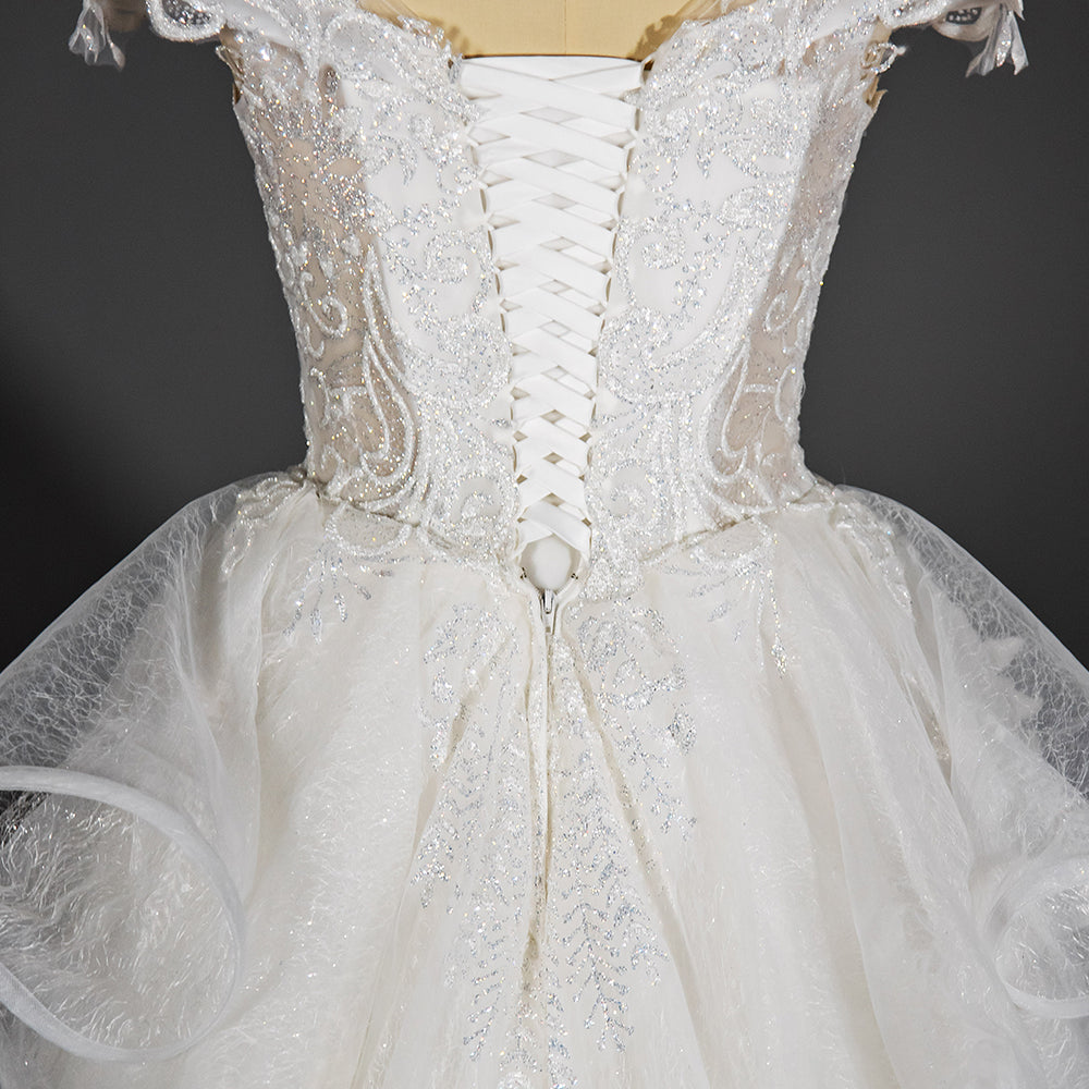 
                      
                        Sequined Short Sleeve Appliqued Ball Gown Wedding Dress with Tulle Ruffles
                      
                    