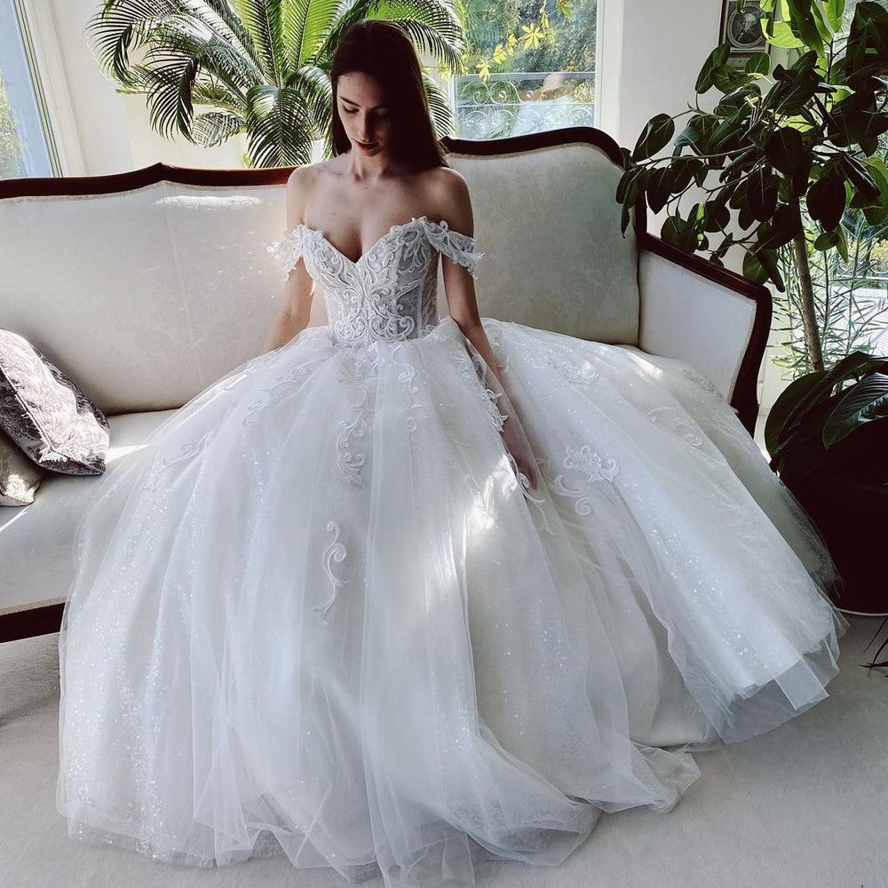 
                      
                        Charming Long A-Line Off-the-Shoulder Tulle Wedding Dress
                      
                    