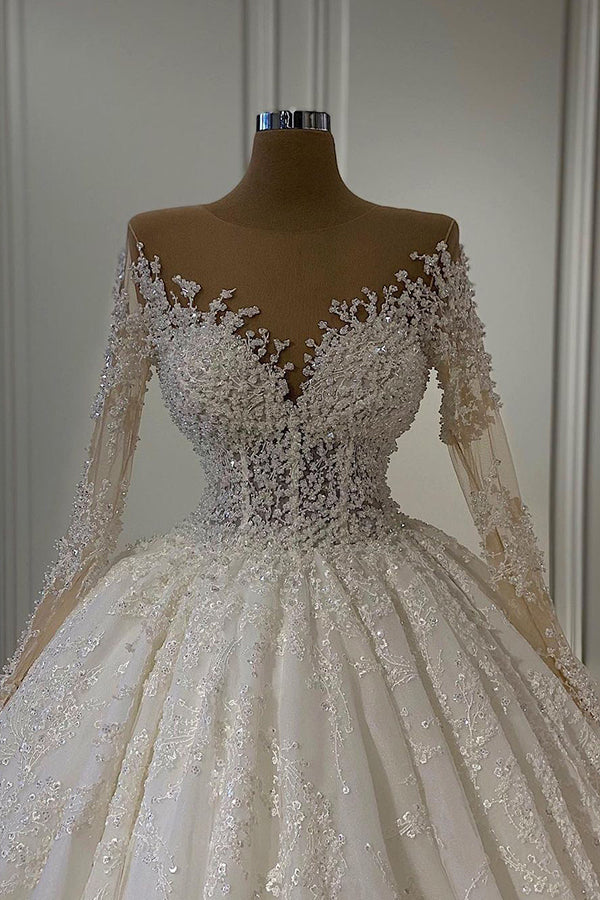 
                      
                        Gorgeous Long Sleeve Ball Gown Wedding Dress with Lace and Beading
                      
                    