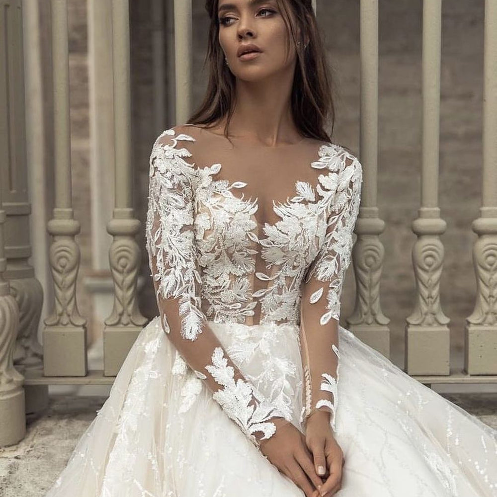 
                      
                        Gorgeous Bateau Long Sleeve Train A-Line Wedding Dress with Lace Appliques
                      
                    