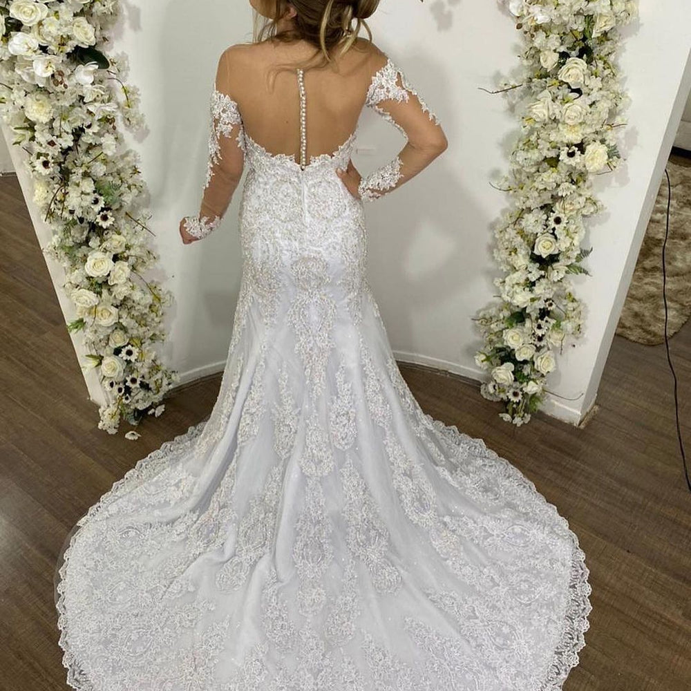 
                      
                        Beautiful Off-the-Shoulder Mermaid Tulle Wedding Dress with Sleeves and Lace
                      
                    