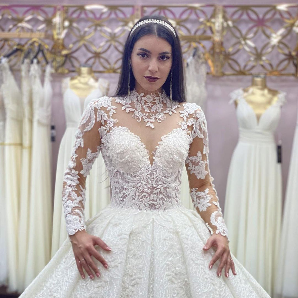 
                      
                        High Neck Jewel Long Sleeve Wedding Dress with Lace Appliques
                      
                    