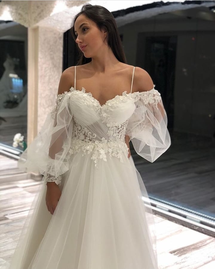 
                      
                        A-Line Off-the-Shoulder Long Sleeve Spaghetti Strap Wedding Dress with Lace Appliques and Tulle
                      
                    