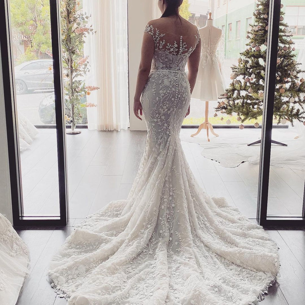 
                      
                        Off-the-Shoulder Backless Floor-Length Mermaid Wedding Dress with Lace Appliques
                      
                    