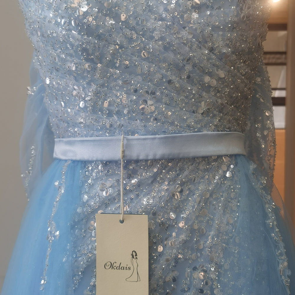 
                      
                        Off-the-Shoulder Sky Blue Prom Dress with Sequins and Slit
                      
                    