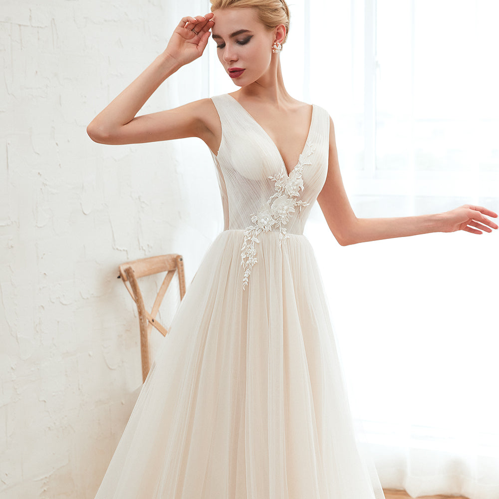 
                      
                        Romantic Wide Strap Deep V-Neck Floor-Length A-Line Wedding Dress with Tulle
                      
                    