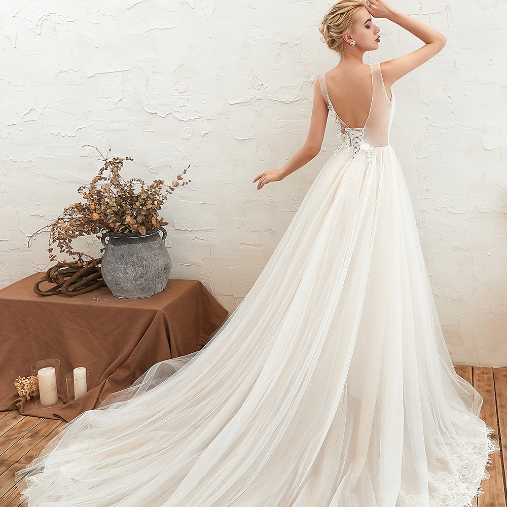 
                      
                        Romantic Wide Strap Deep V-Neck Floor-Length A-Line Wedding Dress with Tulle
                      
                    