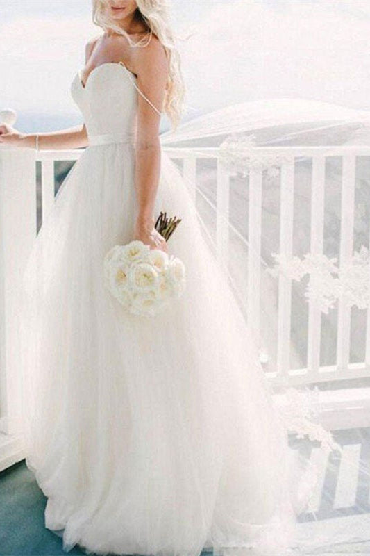 
                      
                        Spaghetti Strap Tulle Wedding Dress
                      
                    