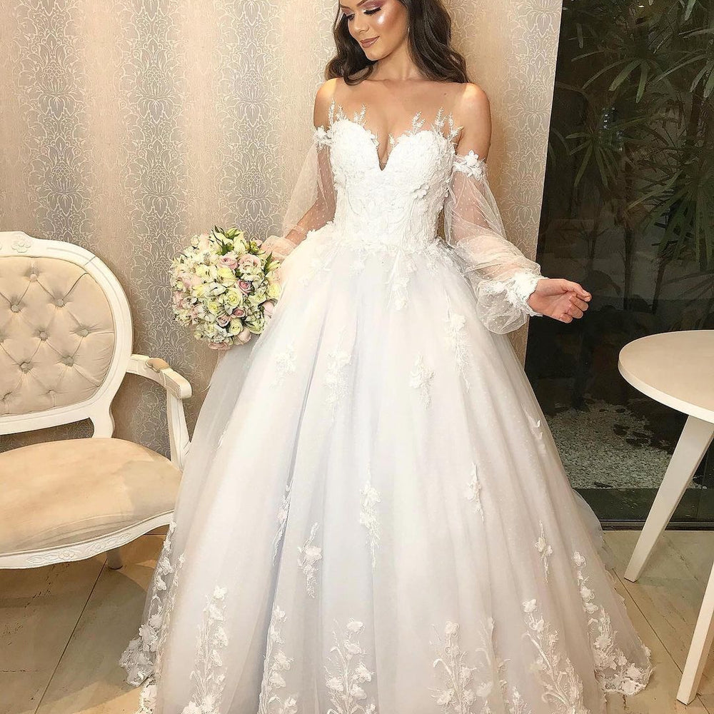 
                      
                        Elegant Long Princess Off-the-Shoulder Wedding Dress with Bubble Sleeves and Tulle
                      
                    