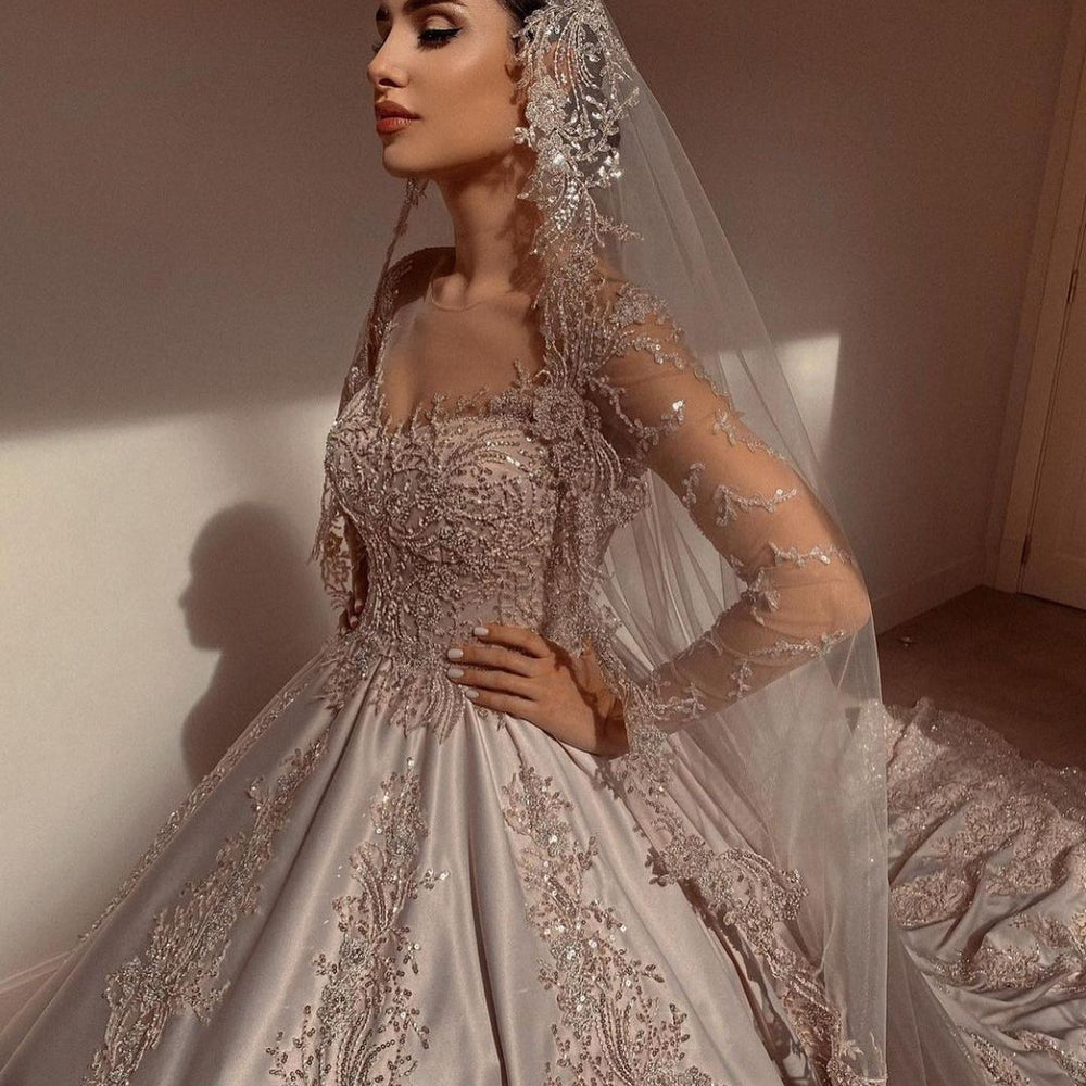 
                      
                        Gorgeous Sweetheart Long Sleeve Satin Wedding Dress with Beadings and Pearls
                      
                    