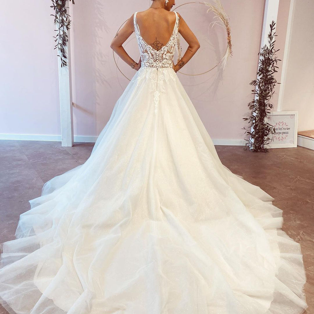 
                      
                        Elegant A-Line Deep V-Neck Backless Wedding Dress with Lace Appliques
                      
                    