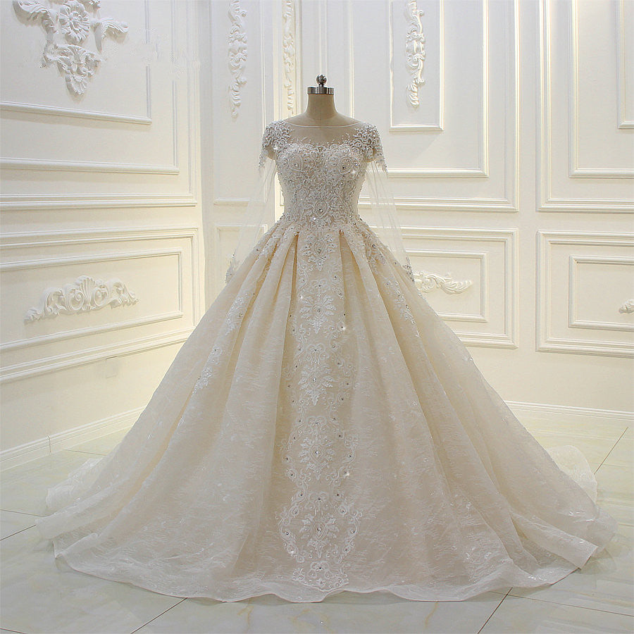 
                      
                        Bateau Long Sleeve Beaded Ball Gown Wedding Dress with Lace Appliques
                      
                    