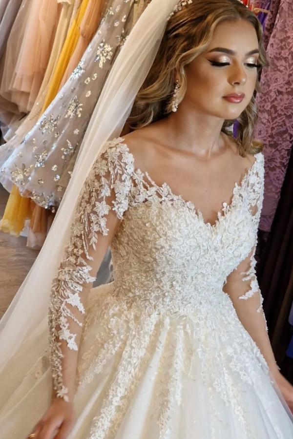 
                      
                        Gorgeous White A-Line V-Neck Lace Wedding Dress with Long Sleeves
                      
                    