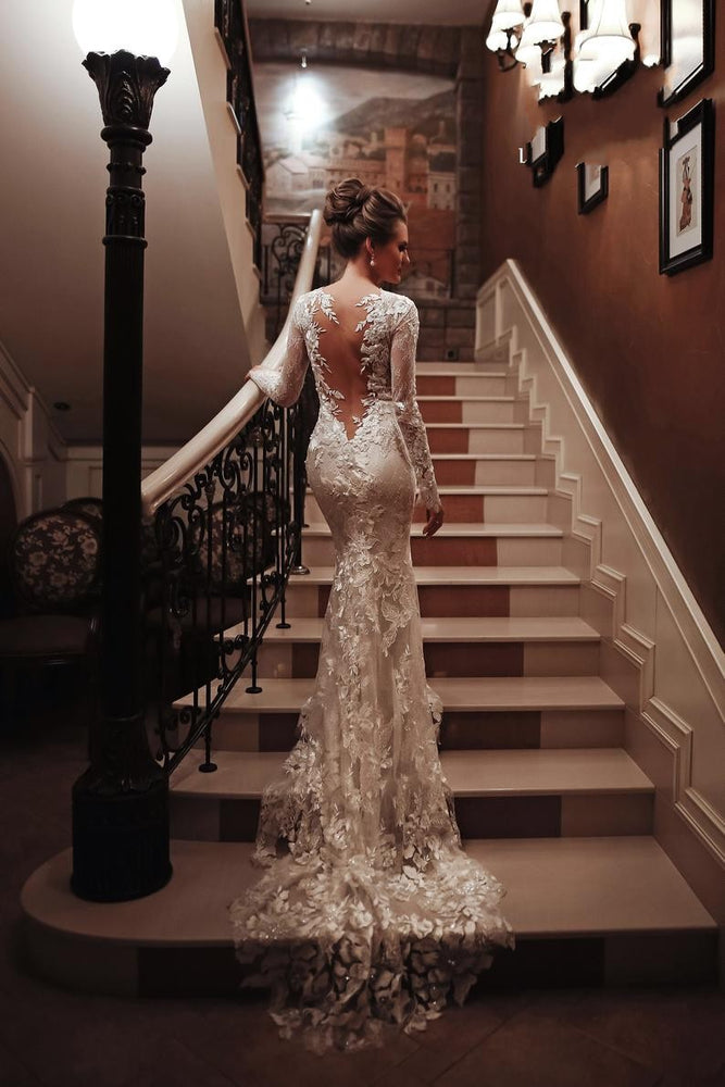 
                      
                        Unique Long Sleeve High Neck Backless Mermaid Wedding Dress with Lace Appliques
                      
                    