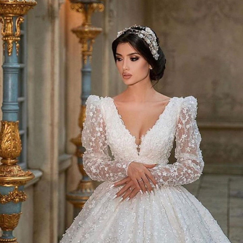 
                      
                        A-Line Deep V-Neck Long Sleeve Train Wedding Dress with Lace Appliques
                      
                    