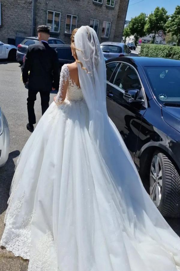 
                      
                        Gorgeous White A-Line V-Neck Lace Wedding Dress with Long Sleeves
                      
                    