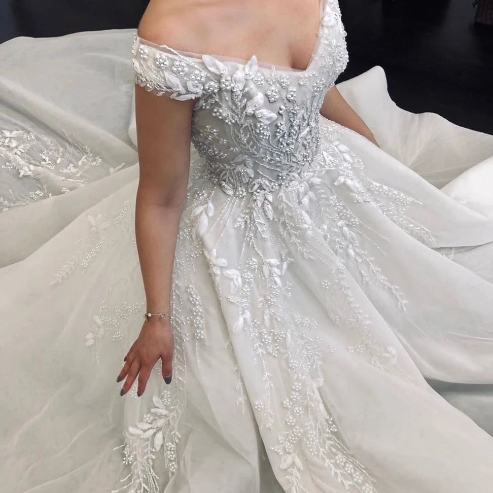 
                      
                        Ball Gown Off The Shoulder Princess Wedding Dress With Beading
                      
                    