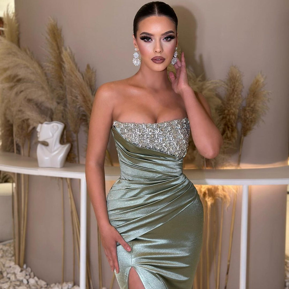 
                      
                        Sage Green Sleeveless Prom Dress with Strapless Pleated Slit
                      
                    