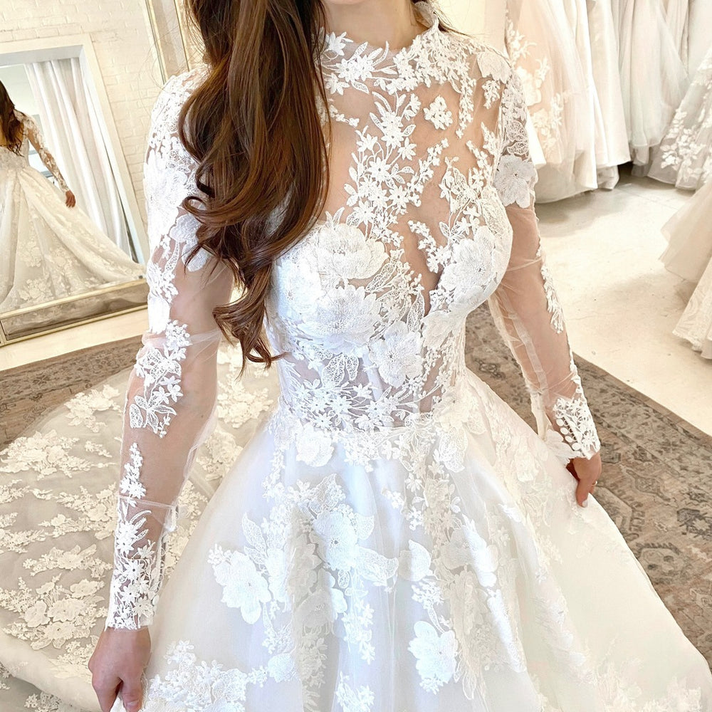 
                      
                        Long A-Line High Neck Open Back Wedding Dress with Lace Sleeves
                      
                    