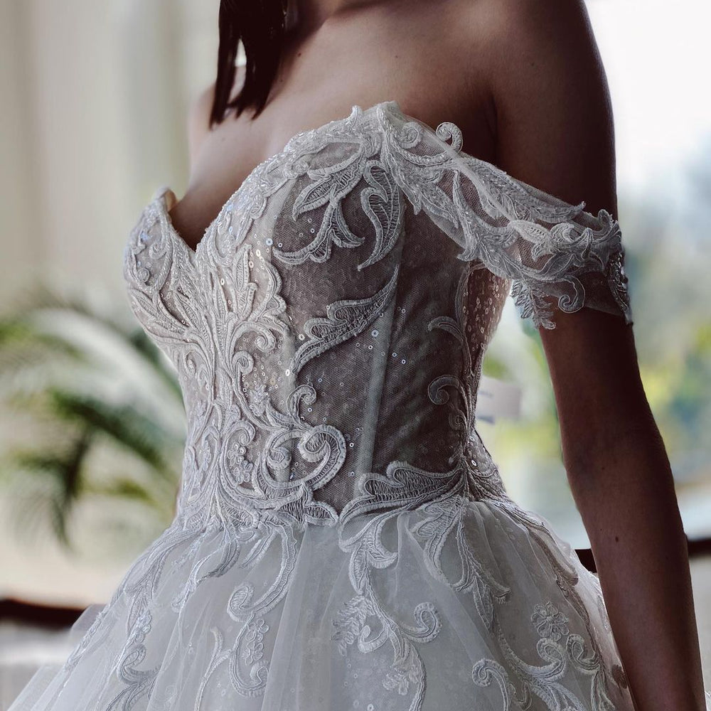 
                      
                        Charming Long A-Line Off-the-Shoulder Tulle Wedding Dress
                      
                    