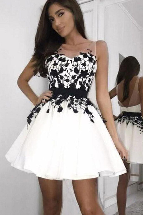 
                      
                        Chic White Tulle V Back Short Homecoming Dress With Appliques
                      
                    