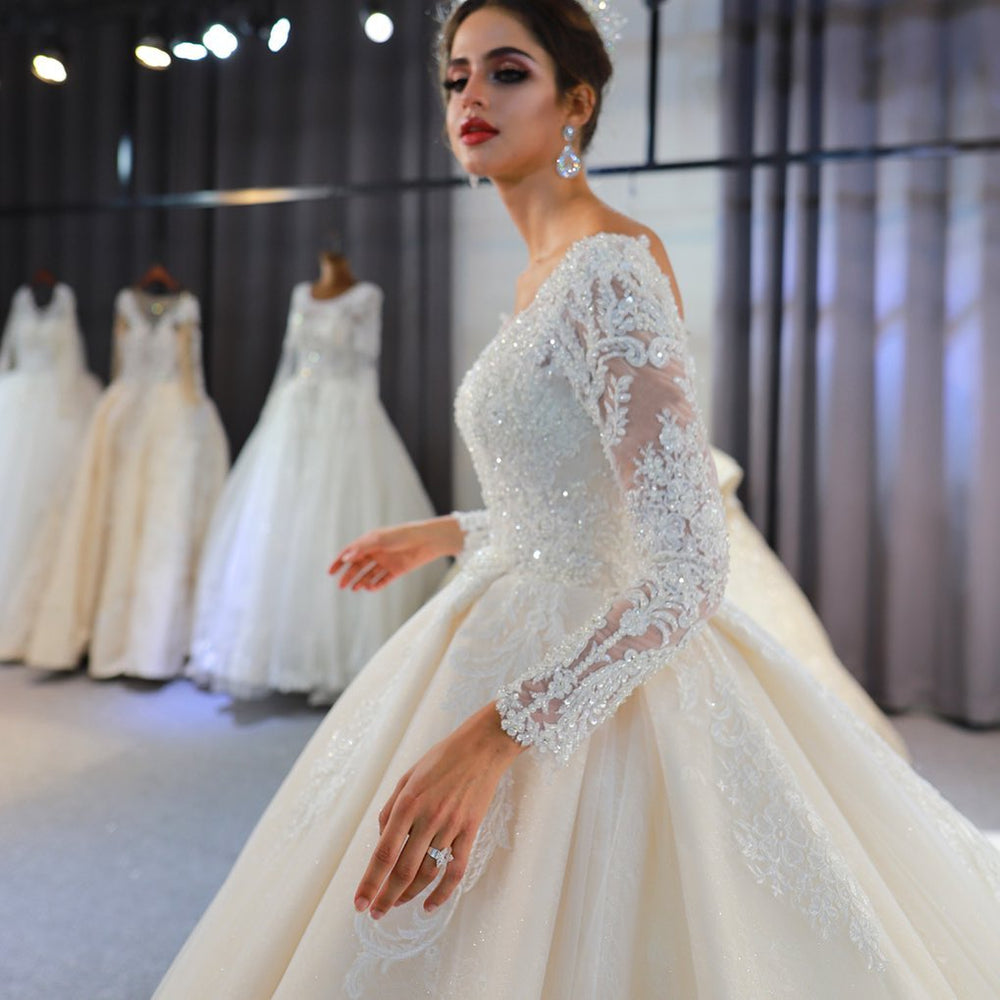 
                      
                        Classy Train A-Line Sweetheart Backless Long Sleeve Wedding Dress with Lace Appliques and Sequins
                      
                    