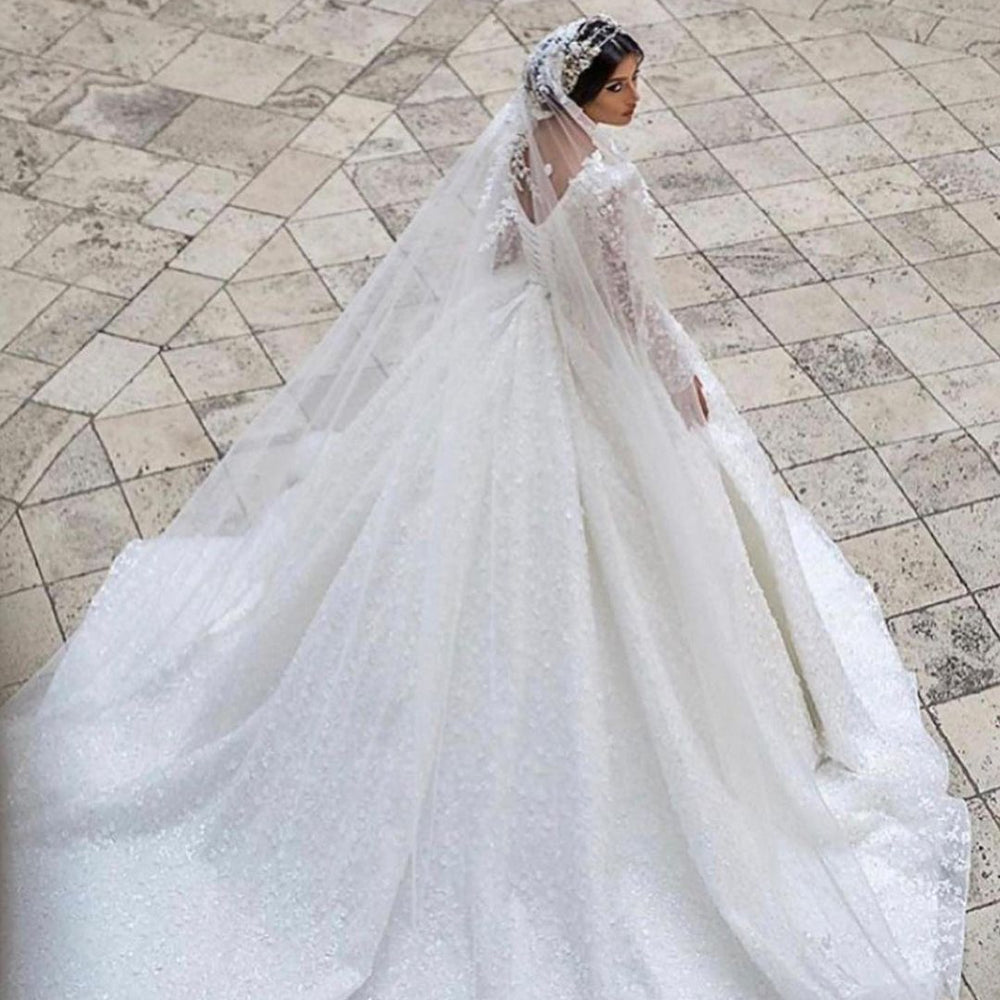 
                      
                        A-Line Deep V-Neck Long Sleeve Train Wedding Dress with Lace Appliques
                      
                    