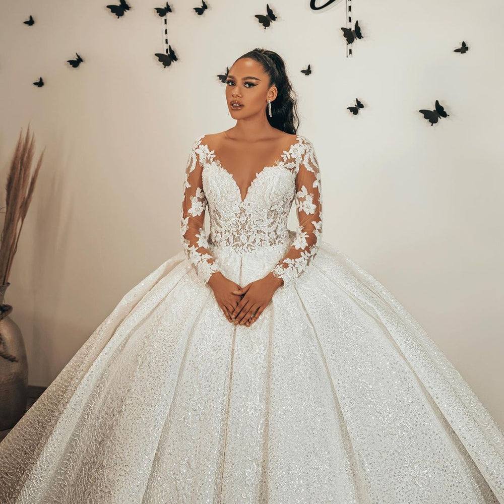 
                      
                        Ball Gown Sweetheart Long Sleeve Wedding Dress with Ruffles, Lace Appliques, and Sequins
                      
                    