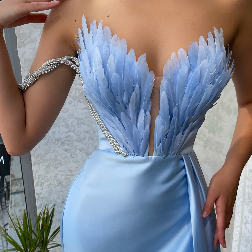 
                      
                        Baby Blue Off-The-Shoulder V-Neck Mermaid Prom Dress with Feathers
                      
                    