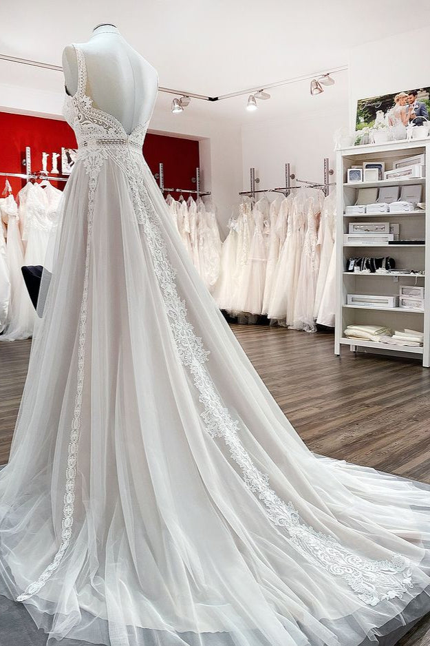 
                      
                        A-Line Wedding Dress with Ruffles, Open Back, and Tulle Lace
                      
                    