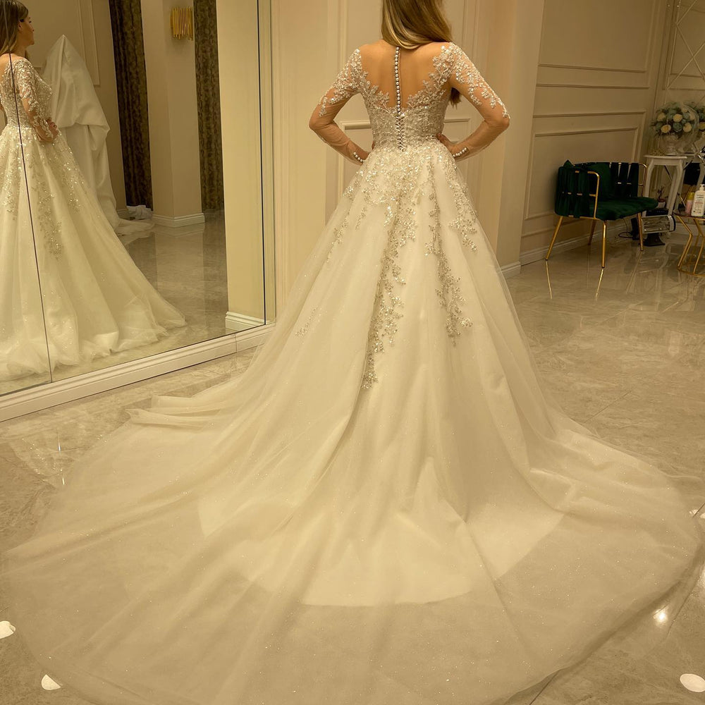 
                      
                        Elegant Long A-Line Wedding Dress with Lace Appliques and Sleeves
                      
                    