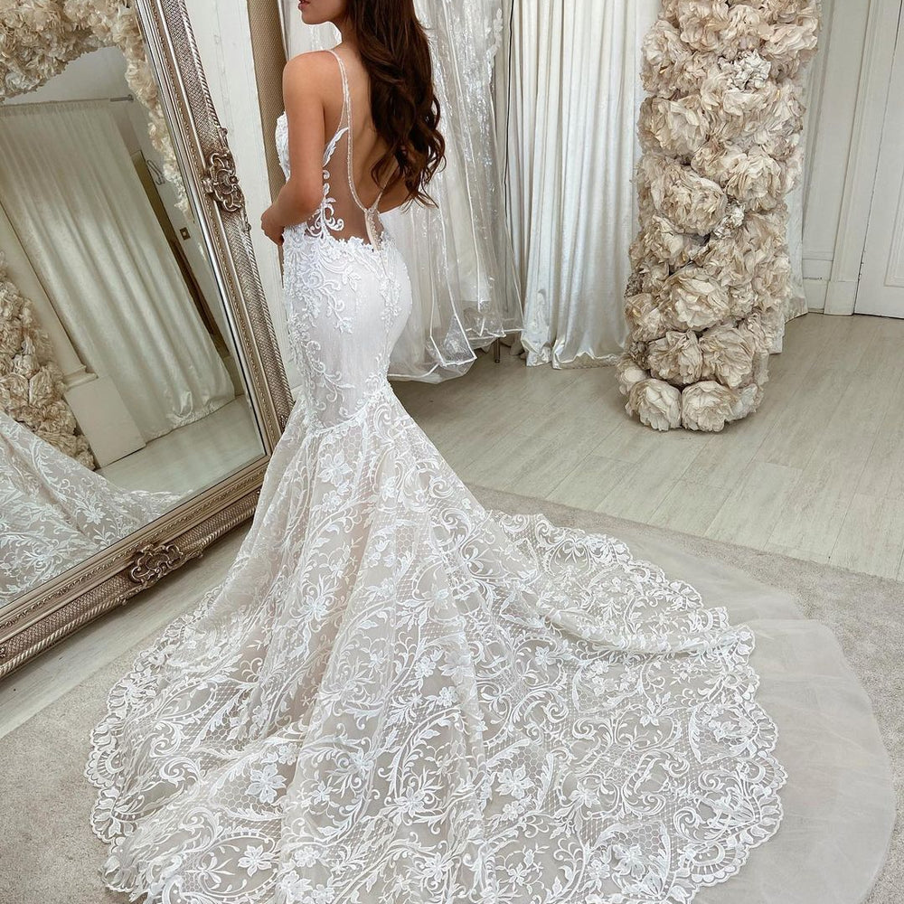 
                      
                        Long Mermaid Sweetheart Spaghetti Strap Wedding Dress with Lace and Backless Design
                      
                    